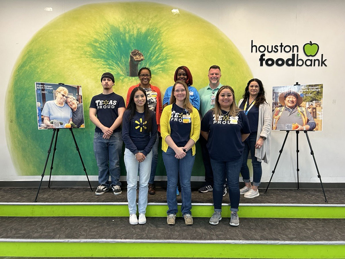 Walmart employees volunteering with Houston Food Bank to Fight Hunger and Spark Change!